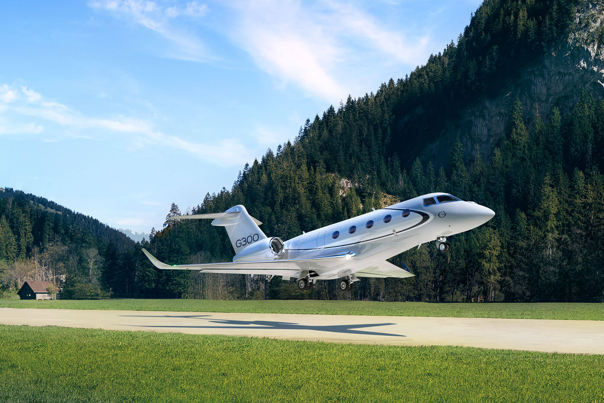 Gulfstream G300 in flight above mountain with early morning light