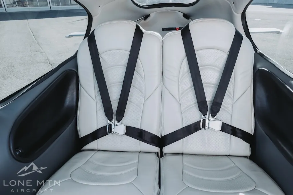 Cirrus SR22 G3 rear passenger seats white leather interior cabin