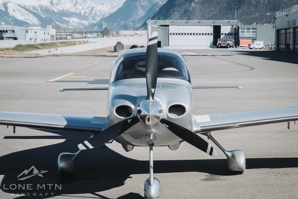 Cirrus SR22 G3 nose view on ramp showing Hartzell propeller and landing gear