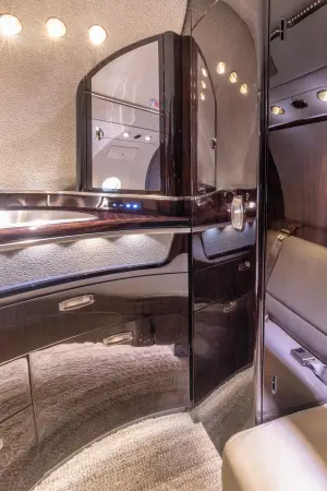 2018 Cessna Citation Latitude lavatory interior with sink mirror storage and premium cabin finish