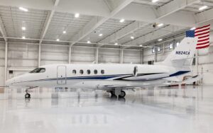 2018 Cessna Citation Latitude for sale side profile in hangar registration N824CA
