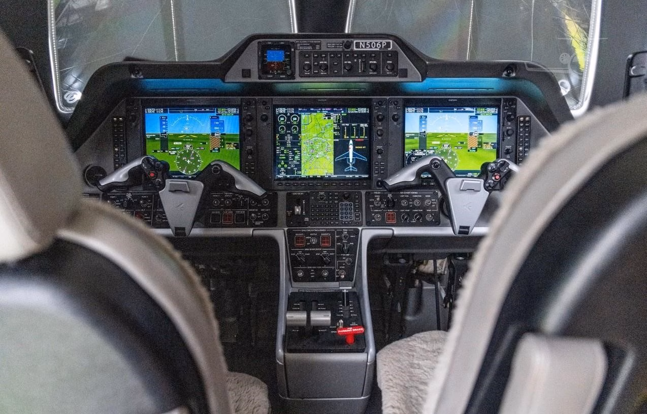 Embraer Phenom 300 cockpit with Garmin Prodigy NXi avionics flight deck