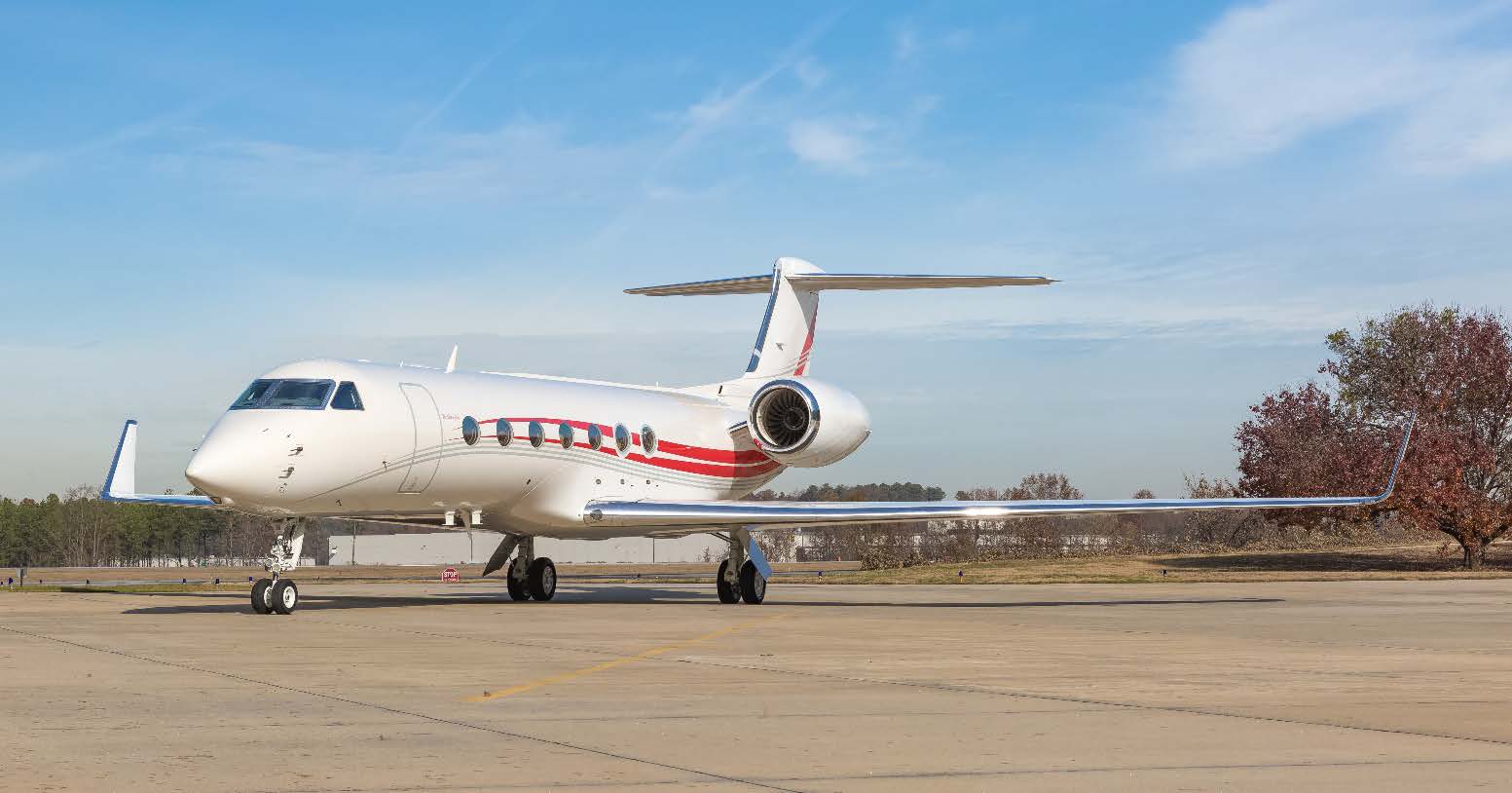 2014 Gulfstream G550 N486RW full exterior side profile on ramp