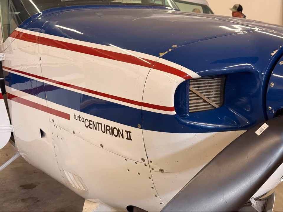 1979 Cessna 210N Turbo Centurion II engine cowling and propeller close-up